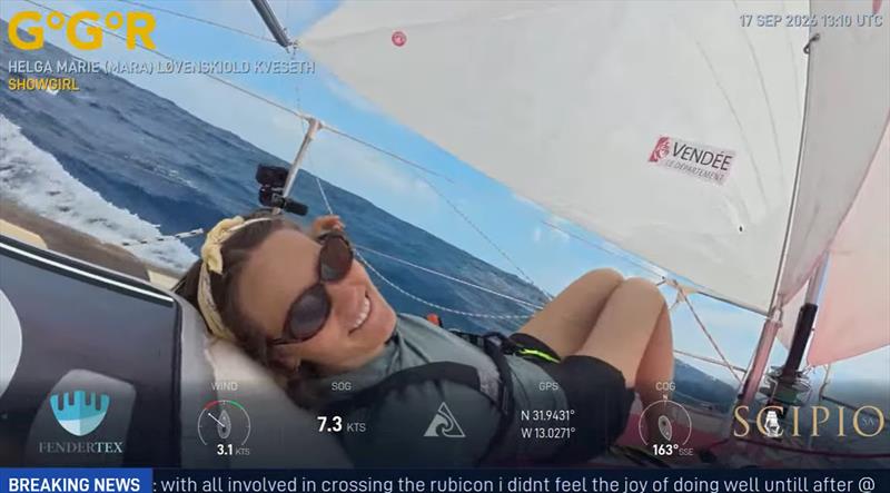 A smile at sea as SHOWGIRL picks up the pace. Norway's Helga Marie enjoys a moment on deck in this GGR Window LIVE image, with the display showing 7.3 knots. The day's race update credited her with 161 nm in 24 hours as the chasing fleet accelerated south