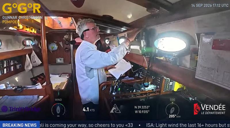 Alone at sea, with world watching. Gunnar Christensen attends to life below deck aboard POMPOEN in this GGR Window LIVE image. The one-way broadcasts reveal everyday routines behind the race, bringing sailors' world ashore while preserving outside world