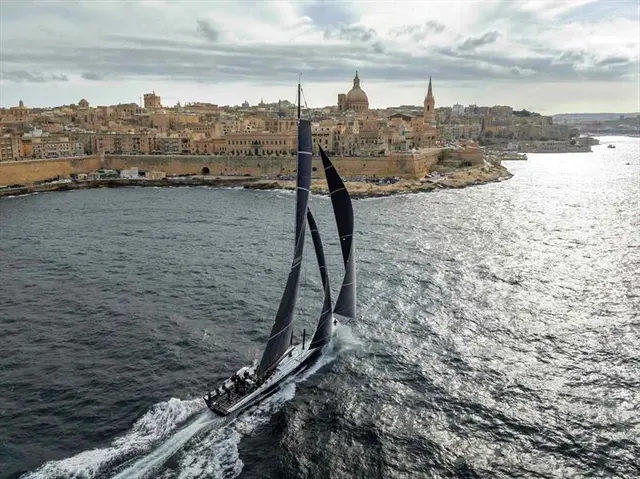 Black Jack speeds into Valletta's Marsamxett Harbour to claim line honours in a 'personal best' time