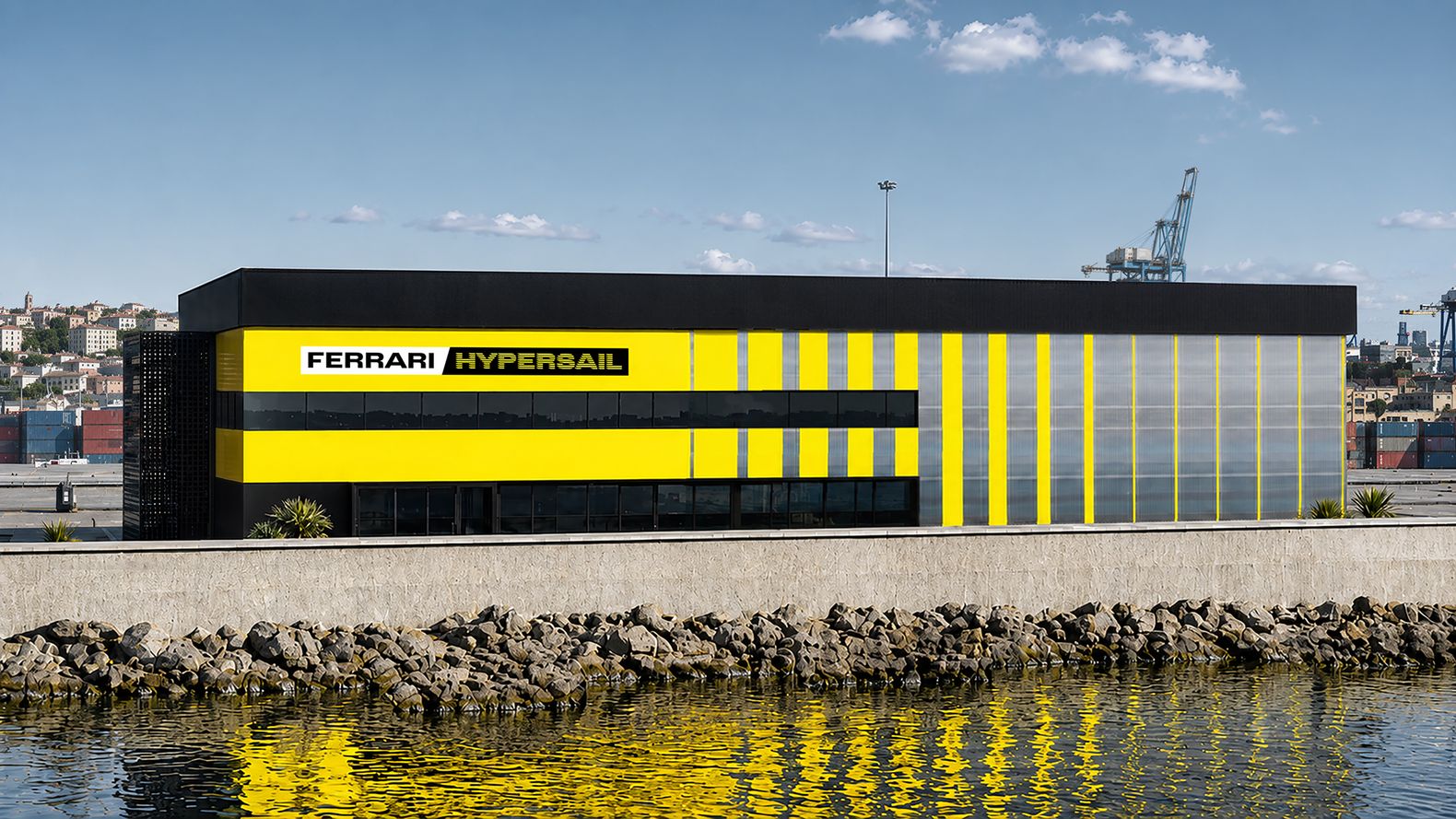 Budynek bazy Ferrari Hypersail w Livorno w żółto-czarnych barwach projektu