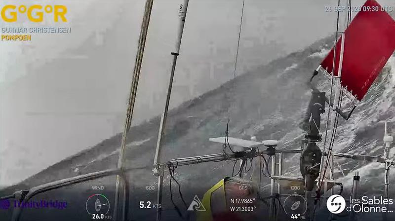 Heavy seas aboard POMPOEN. This GGR Window LIVE image from 26 Sept captures conditions facing American skipper Gunnar Christensen aboard Hans Christian 34 cutter. His account of the storm describes 50-kt winds, five-metre seas & equipment lost from stern