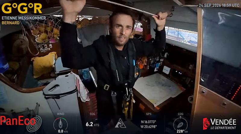 Holding on as the seas build. Swiss skipper Etienne Messikommer steadies himself below deck aboard BERNARD in this GGR Window LIVE image from 24 September