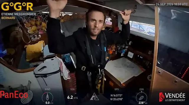 Holding on as the seas build. Swiss skipper Etienne Messikommer steadies himself below deck aboard BERNARD in this GGR Window LIVE image from 24 September